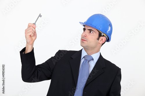Photo: Man wearing hard hat Man wearing hard hat
