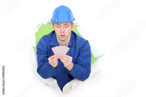Photo: Builder amazed by the card he's been dealt Builder amazed by the card he's been dealt