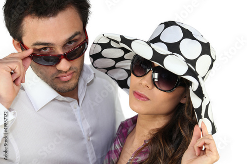 Photo: Young man and young woman fashionable Young man and young woman fashionable