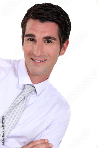 Photo: portrait of successful businessman isolated on white portrait of successful businessman isolated on white