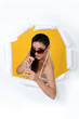 a woman drinking orange juice