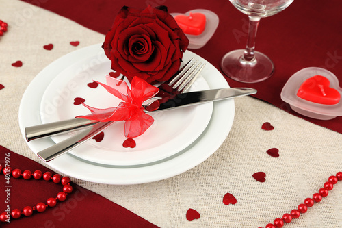 Photo: Table setting in honor of Valentine's Day close-up Table setting in honor of Valentine's Day close-up