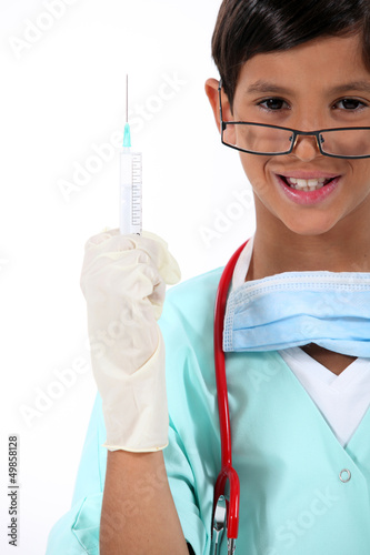 Photo: Child dresses as a surgeon Child dresses as a surgeon