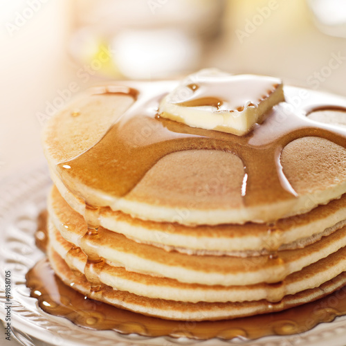Photo: Breakfast food - stack of pancakes with syrup and butter Breakfast food - stack of pancakes with syrup and butter