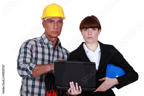 Photo: Architect and engineer with a laptop Architect and engineer with a laptop