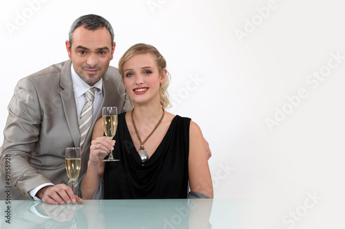 Photo: Couple toasting their anniversary Couple toasting their anniversary