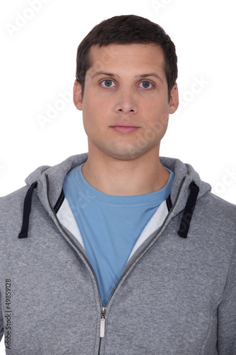 Photo: Man wearing hooded top Man wearing hooded top