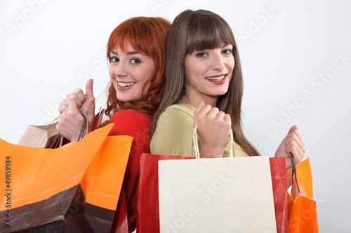 Photo: Young women on a shopping spree Young women on a shopping spree