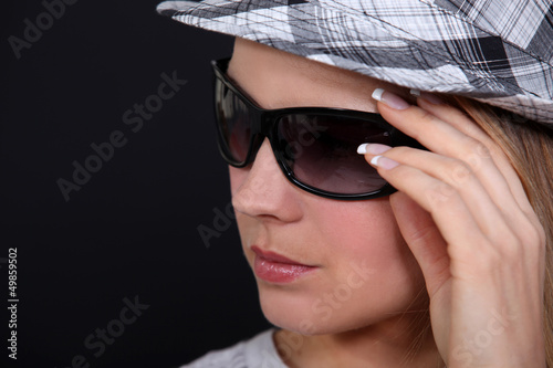 Photo: A female model in summer outfit. A female model in summer outfit.