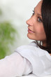 Woman looking over her shoulder