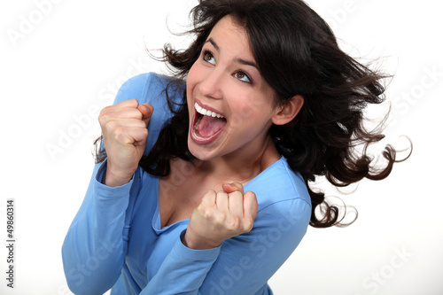 Photo: An ecstatic brunette. An ecstatic brunette.