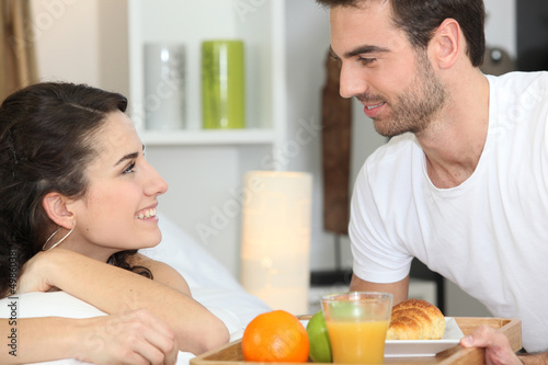 Photo: Couple having breakfast Couple having breakfast