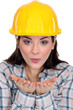 Tradeswoman blowing kisses