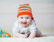 happy baby boy weared in hat