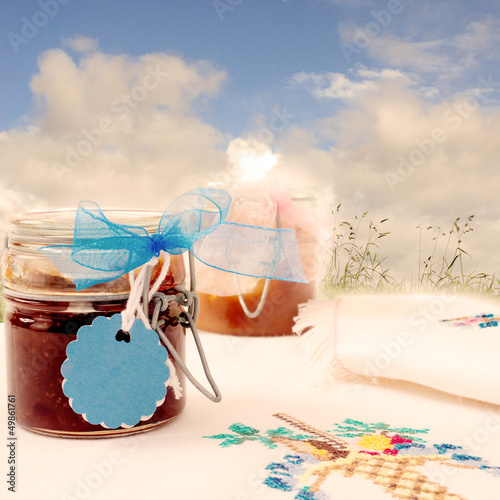 Photo: jars of jam in the field jars of jam in the field
