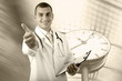 Smiling medical doctor with stethoscope on the hospitals backgro