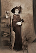 Sepia portrait of woman with a dog