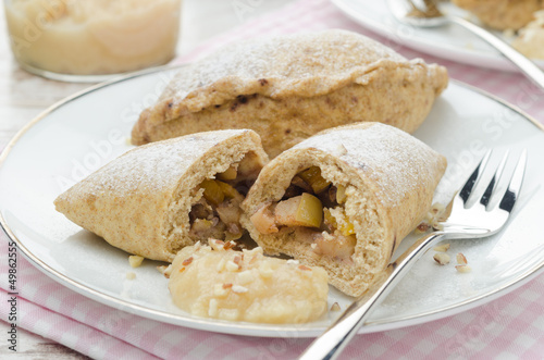 Photo: Whole-grain pies with apples and nuts closeup Whole-grain pies with apples and nuts closeup