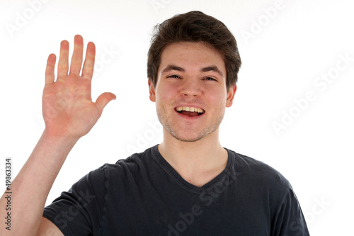 Photo: Freundlicher Mann winkt Freundlicher Mann winkt
