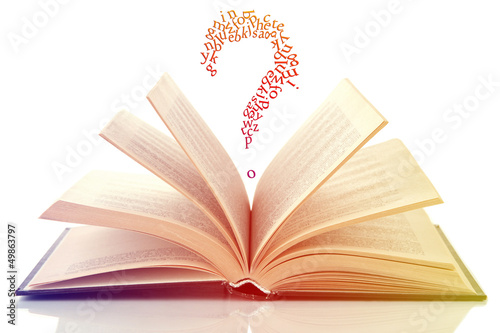Photo: Opened book with letters flying out of it on white Opened book with letters flying out of it on white