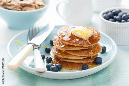 Photo: american pancakes with syrup and blueberry american pancakes with syrup and blueberry