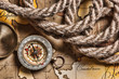 compass and rope on map