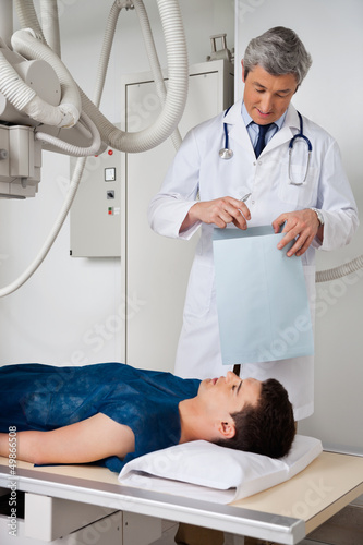 Photo: Male Radiologist With Patient Male Radiologist With Patient