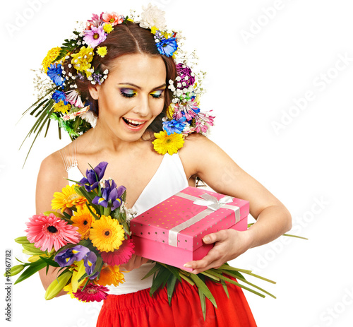 Photo: Woman with gift box and flower. Woman with gift box and flower.