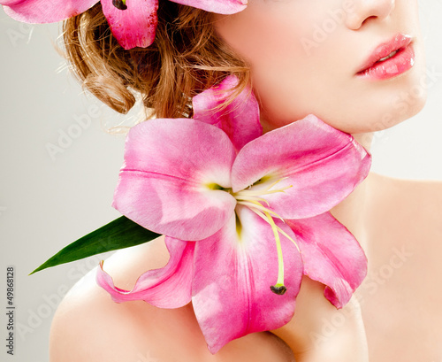 Photo: beautiful girl with pink lilies beautiful girl with pink lilies