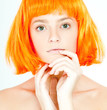 Foto: beautiful girl in a red wig beautiful girl in a red wig