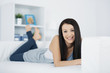 Beautiful woman resting on couch.