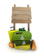 Baggage and wooden sign