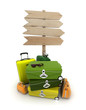 Baggage and wooden sign