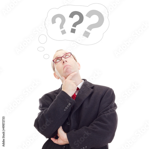 Photo: Business person thinking about question Business person thinking about question
