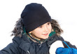 Cute boy playing with snow