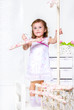 Photo: Girl with a coat hanger Girl with a coat hanger