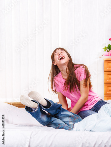 Photo: Laughing girl and a her brother Laughing girl and a her brother