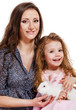 Mother and girl with a pet