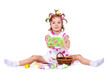 Girl with Easter eggs and greeting card