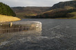 Across the ice to the hills on dove stone reservoir