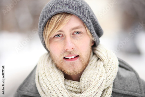 Photo: Young man in winter clothes Young man in winter clothes