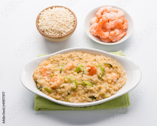 Illustration: Risotto con gamberetti e zucchini - Rice with shrimps Risotto con gamberetti e zucchini - Rice with shrimps
