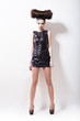 Emo. Haute couture. Woman in Black Leather Dress on Podium