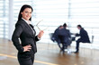 Photo: Confident female team leader Confident female team leader