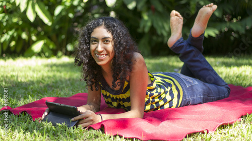 Photo: Teenager using a tablet Teenager using a tablet