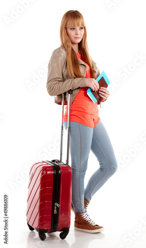 Photo: young girl with suitcase on white young girl with suitcase on white