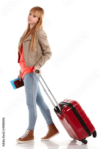 Photo: young girl with suitcase on white young girl with suitcase on white