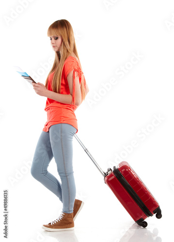 Photo: young girl with suitcase on white young girl with suitcase on white