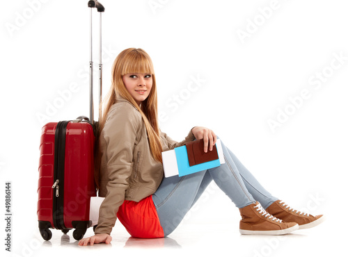 Photo: young girl with suitcase on white young girl with suitcase on white