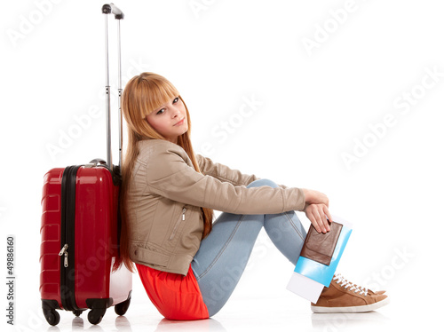 Photo: young girl with suitcase on white young girl with suitcase on white